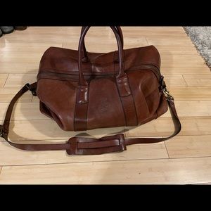 Polo by Ralph Lauren rugged Leather Duffle Bag with dust bag. Excellent Cond